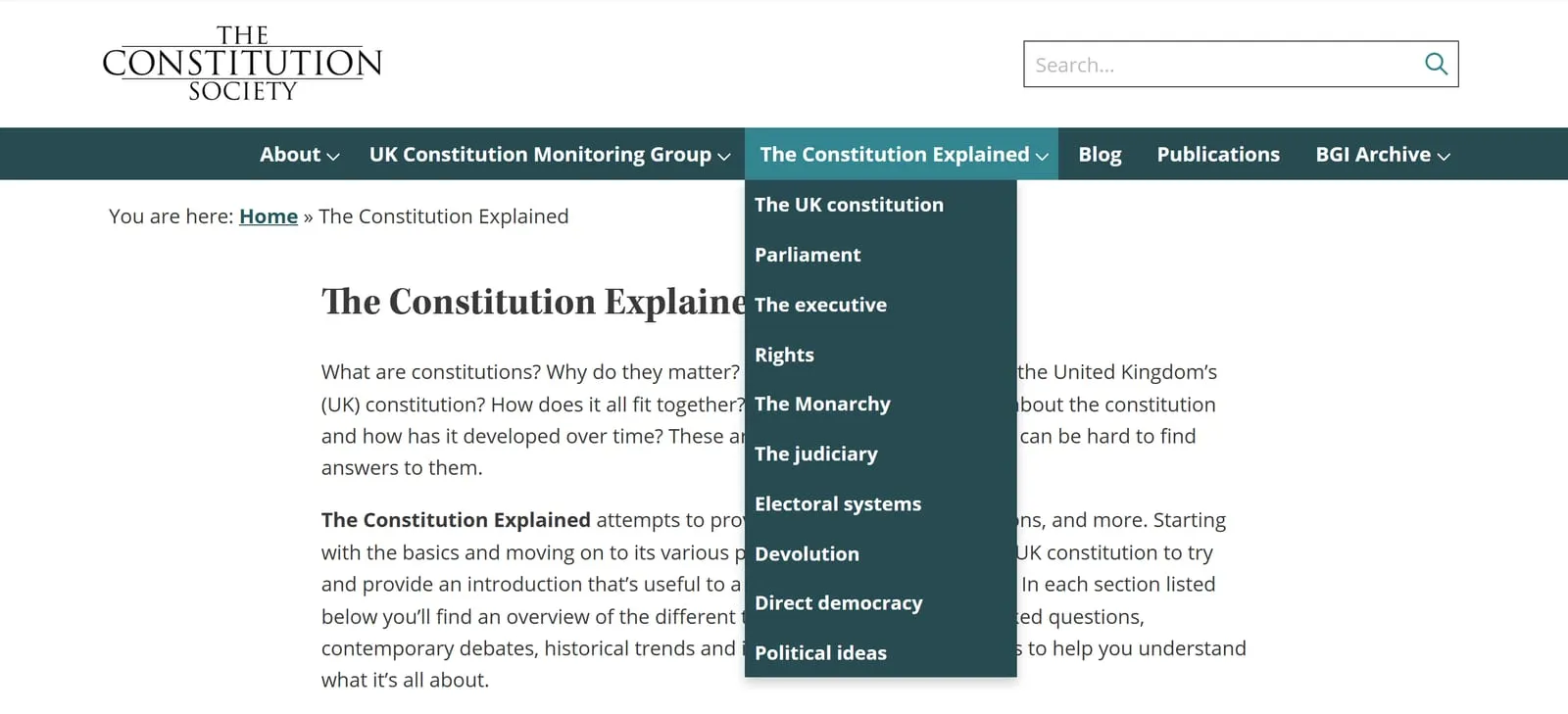 The Constitution Society header with the Constitution Explained menu open, listing ten topic pages: the UK constitution, Parliament, the executive, rights, the monarchy, the judiciary, electoral systems, devolution, direct democracy and political ideas