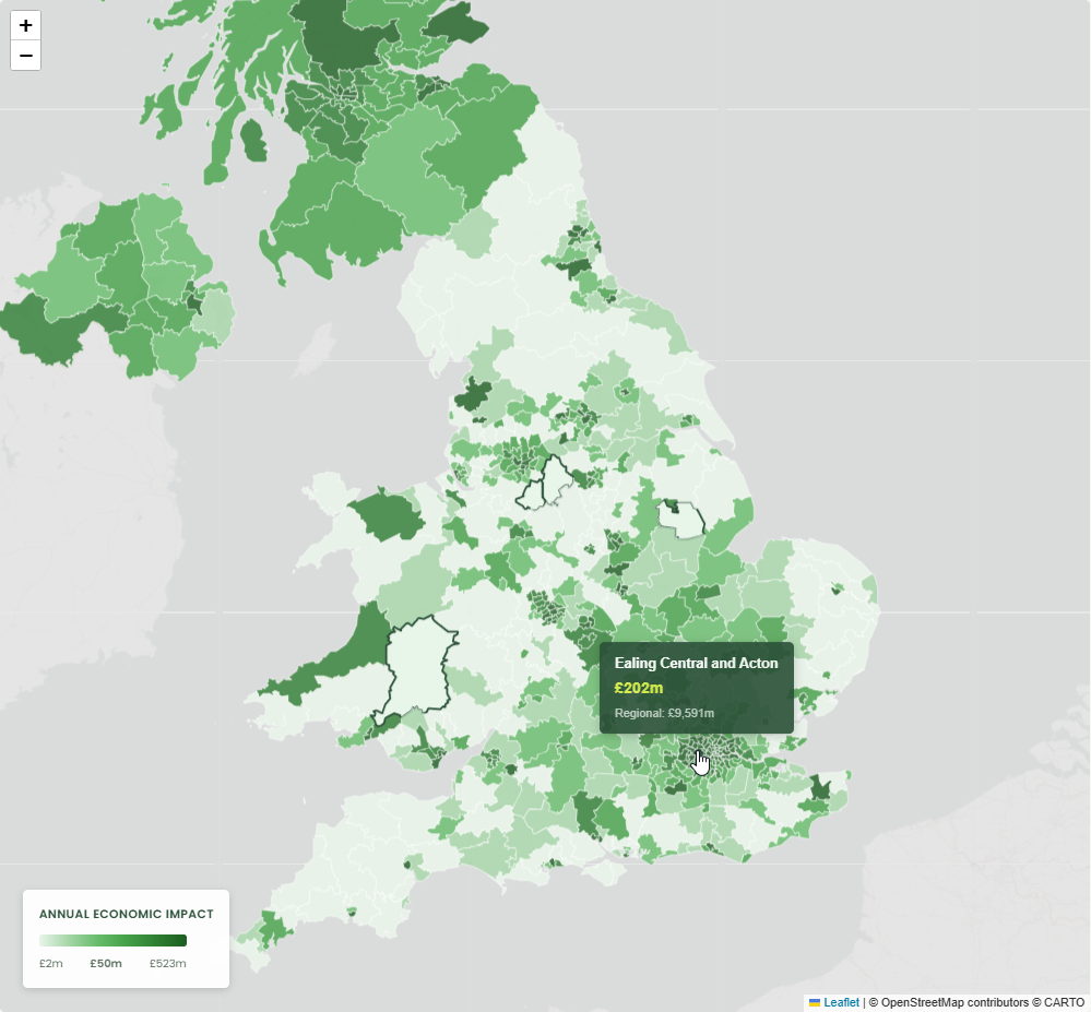 Zoomed into the map — hovering a constituency shows its annual economic impact, here Ealing Central and Acton at £202m